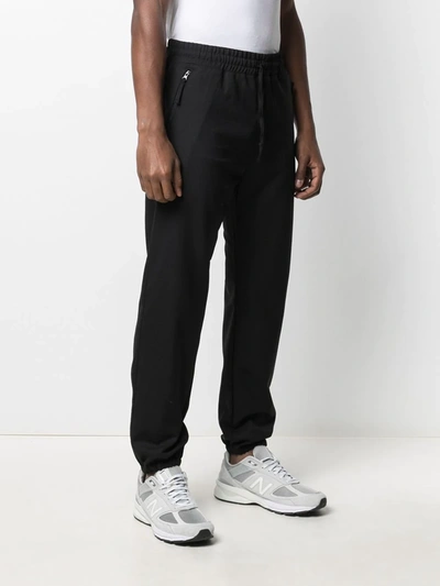Shop Carhartt Valiant Tapered Track Pants In Black