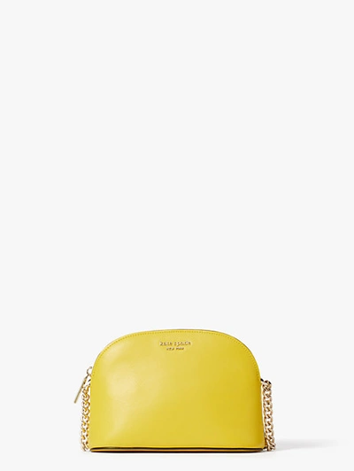 Shop Kate Spade Spencer Small Dome Crossbody In Light Bulb