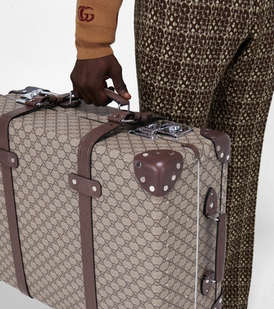 Shop Gucci Globe-trotter X  Gg Medium Suitcase In Beige