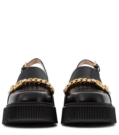 Shop Gucci Leather Slingback Loafers In Black