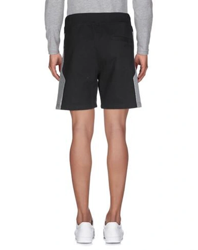 Shop Just Cavalli Shorts & Bermuda Shorts In Black