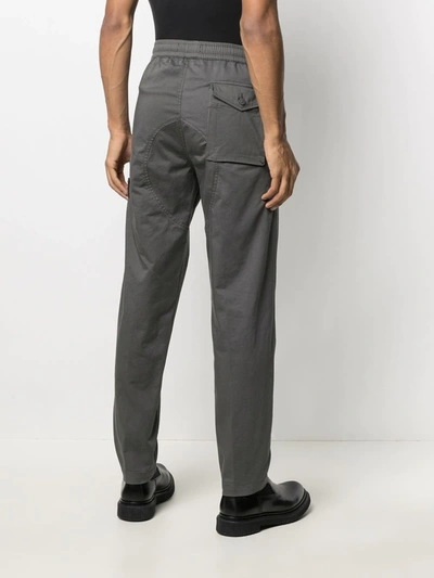 Shop Stone Island Logo Patch Track Pants In Grey