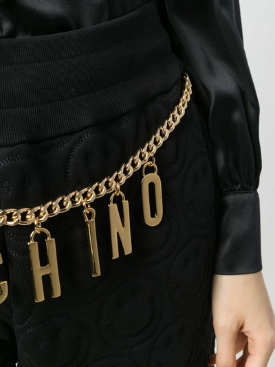 Shop Moschino Logo Chain Track Trousers In Black