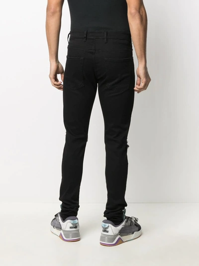 Shop Represent Distressed Skinny-fit Jeans In Black