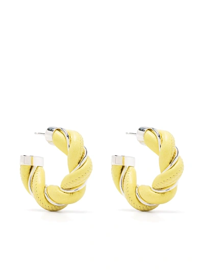 Shop Bottega Veneta Twist Hoop Earrings In Yellow