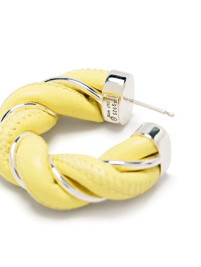 Shop Bottega Veneta Twist Hoop Earrings In Yellow