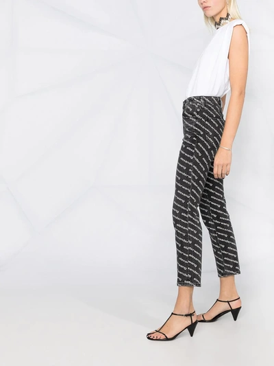 Shop Alexander Wang Mid-rise Logo-print Flared Trousers In Black