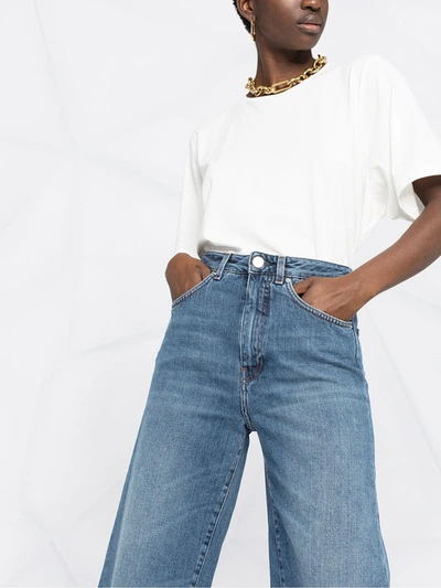 Shop Totême Cropped Wide-leg Jeans In Blue