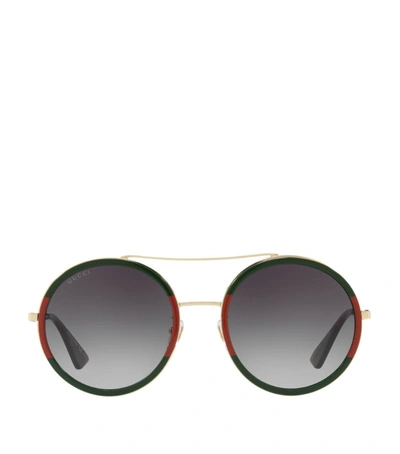 Shop Gucci Stripe Oval Pilot Sunglasses In Brown