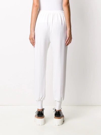 Shop Stella Mccartney Elasticated-waist Tapered Trousers In Neutrals