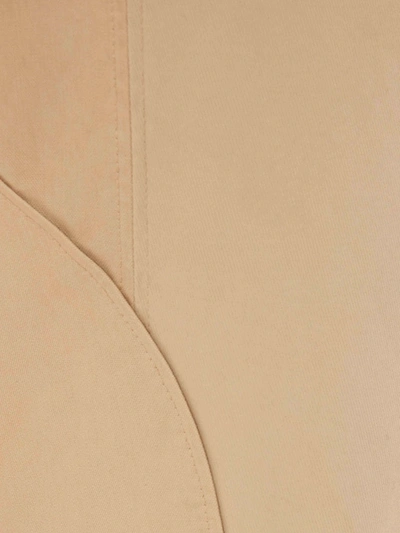 Shop Jw Anderson Belted Tapered Trousers In Neutrals