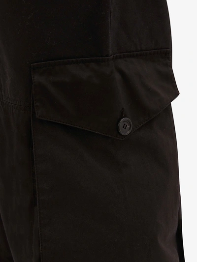 Shop Jw Anderson Belted Cargo Trousers In Black