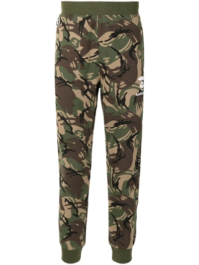 Shop Aape By A Bathing Ape Camouflage-print Tapered Track Pants In Green