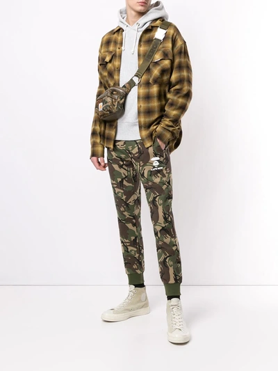 Shop Aape By A Bathing Ape Camouflage-print Tapered Track Pants In Green