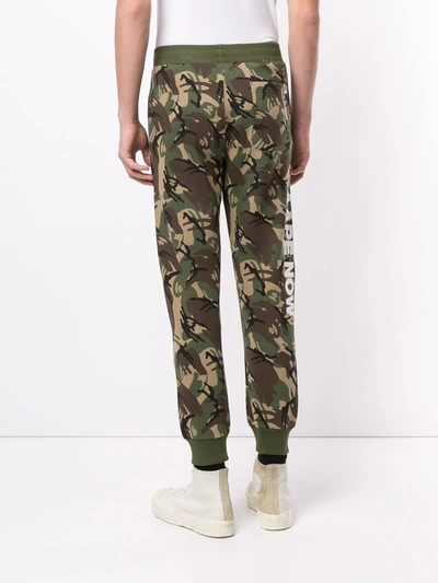 Shop Aape By A Bathing Ape Camouflage-print Tapered Track Pants In Green