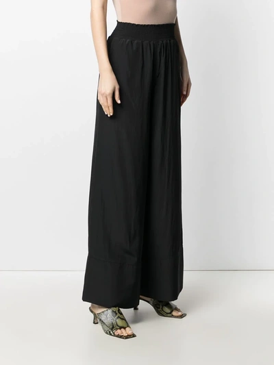 Shop Jw Anderson Pull-on Wide-leg Trousers In Black