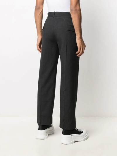 Shop Ader Error Asymmetric Pocket Striped Trousers In Black