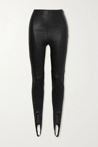 Shop Saint Laurent Leather Stirrup Leggings In Black