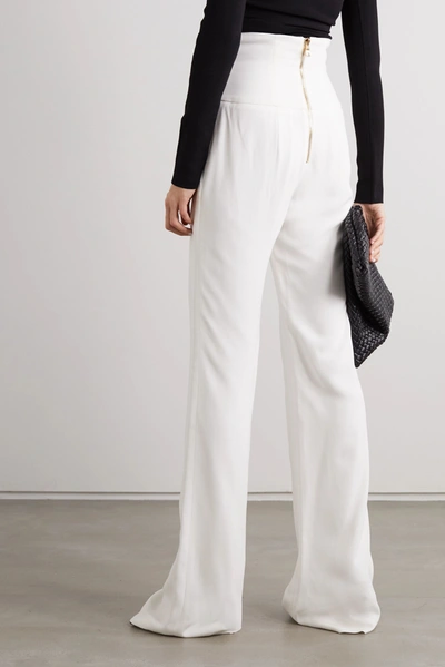 Shop Balmain Button-embellished Crepe Wide-leg Pants In White