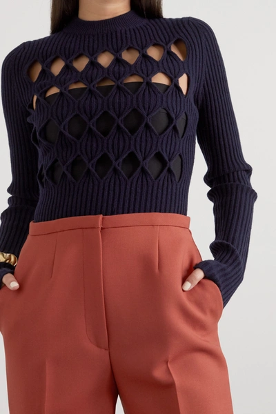 Shop Victoria Beckham Cutout Ribbed Wool-blend Sweater In Midnight Blue