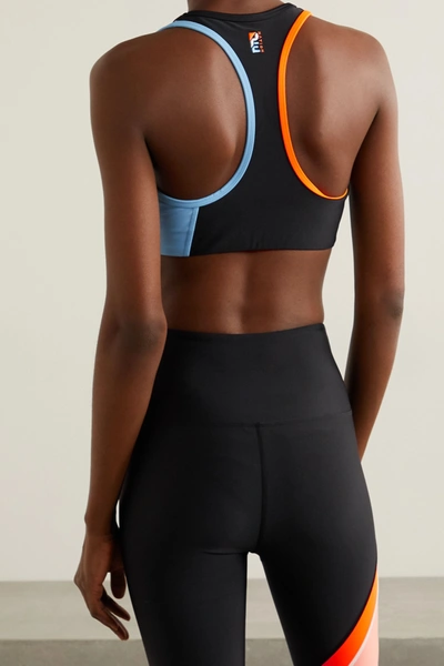 Shop P.e Nation Aerial Drop Color-block Stretch Sports Bra In Black