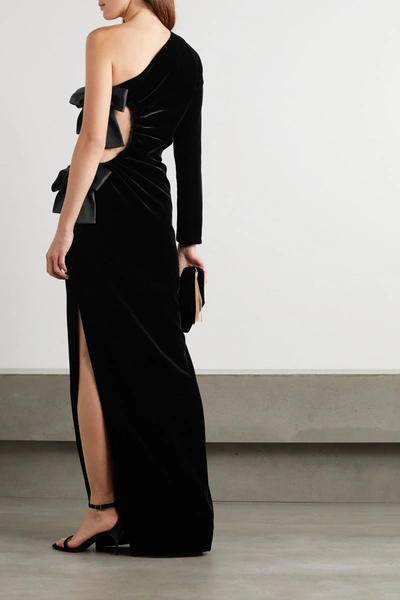 Shop Saint Laurent One-sleeve Bow-embellished Cutout Velvet Gown In Black