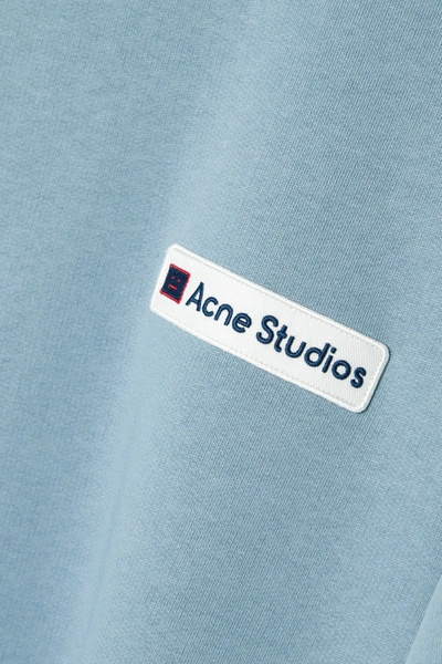 Shop Acne Studios Appliquéd Cotton-jersey Sweatshirt In Light Blue