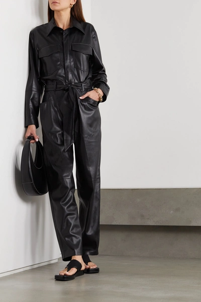 Shop Nanushka Ashton Belted Vegan Leather Jumpsuit In Black