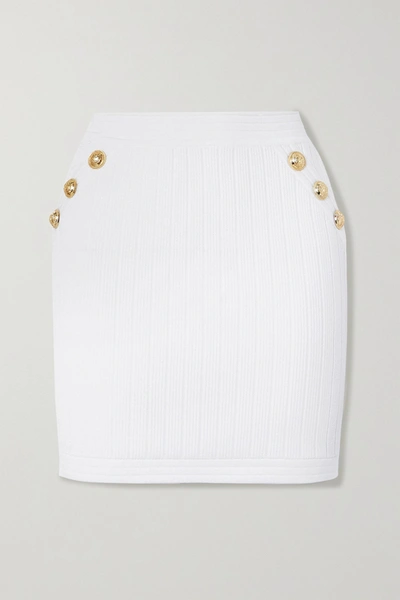 Shop Balmain Button-embellished Ribbed Stretch-knit Mini Skirt In White