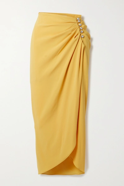 Shop Racil Alexia Crystal-embellished Ruched Crepe De Chine Wrap Midi Skirt In Mustard