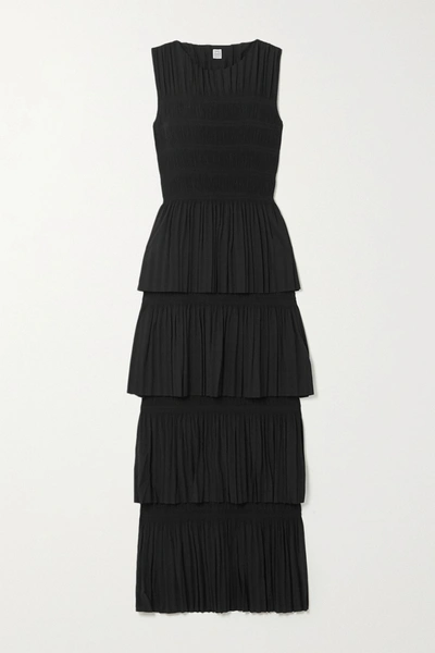 Shop Totême Aramon Tiered Shirred Voile Maxi Dress In Black