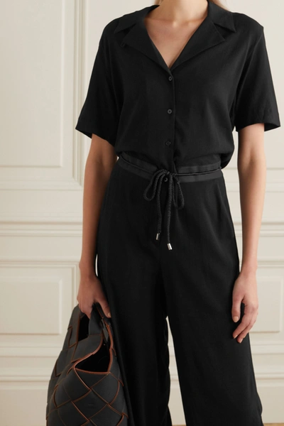 Shop Holzweiler Park Belted Crepe Jumpsuit In Black