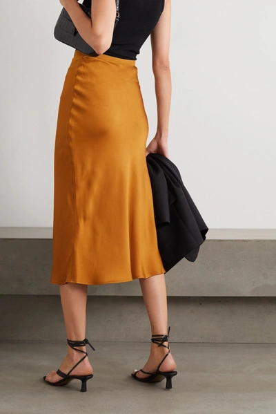 Shop Anine Bing Bar Silk-satin Midi Skirt In Gold