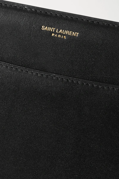 Shop Saint Laurent Reversed Leather Shoulder Bag In Black