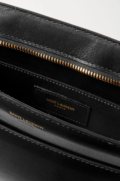 Shop Saint Laurent Reversed Leather Shoulder Bag In Black