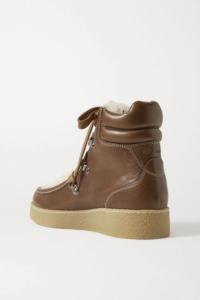 Shop Isabel Marant Alpica Shearling-trimmed Leather Ankle Boots In Brown