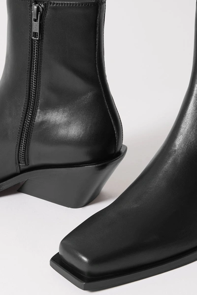 Shop Ann Demeulemeester Leather Ankle Boots In Black