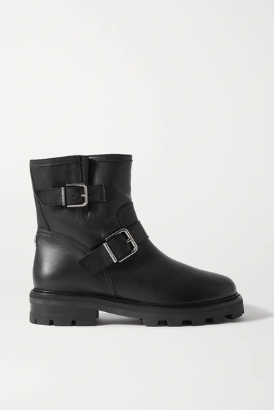 Shop Jimmy Choo Youth Ii Buckled Shearling-lined Leather Ankle Boots In Black