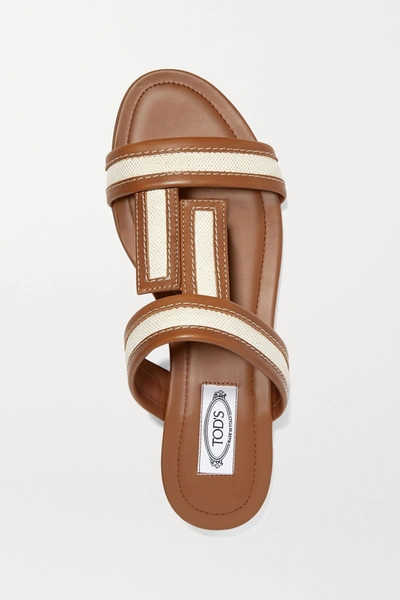 Shop Tod's Canvas And Leather Slides In Tan