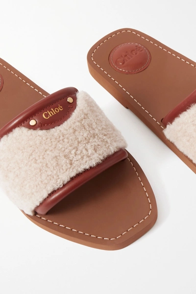 Shop Chloé Woody Leather-trimmed Shearling Slides In Beige