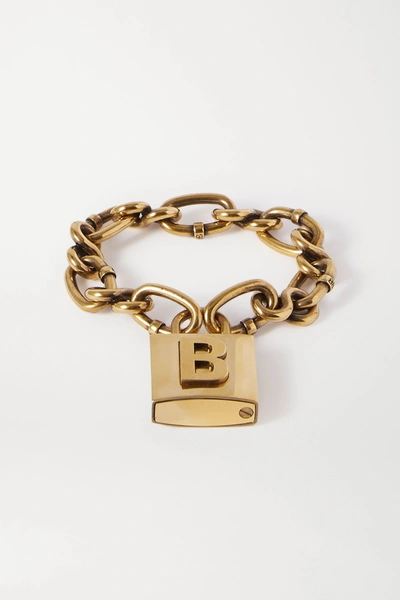 Shop Balenciaga Lock Embossed Gold-tone Bracelet