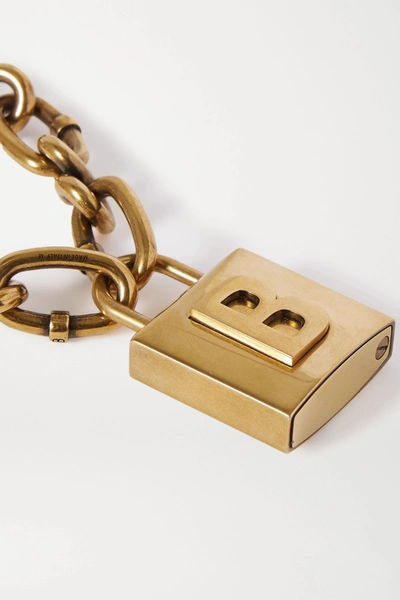 Shop Balenciaga Lock Embossed Gold-tone Bracelet