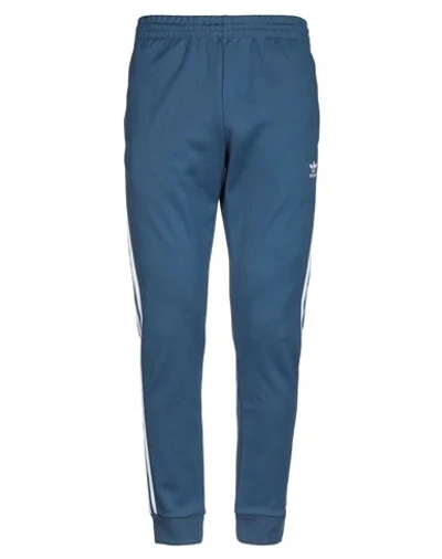 Shop Adidas Originals Casual Pants In Blue