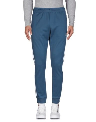 Shop Adidas Originals Casual Pants In Blue