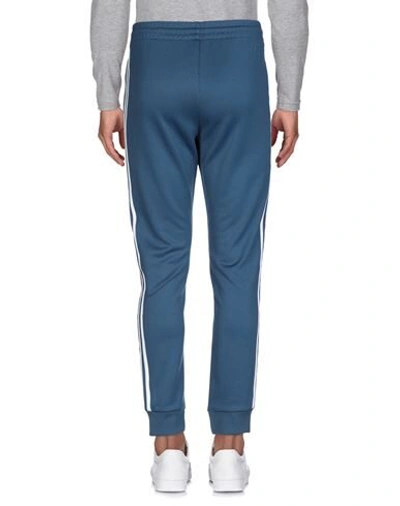 Shop Adidas Originals Casual Pants In Blue