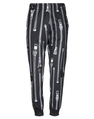 Shop Moschino Pants In Black