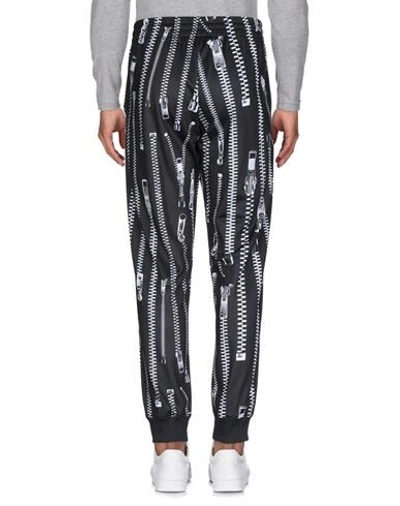 Shop Moschino Pants In Black