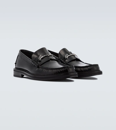 Shop Versace Gv Signature Leather Loafers In Black