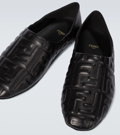 Shop Fendi Ff Embossed Leather Slippers In Black