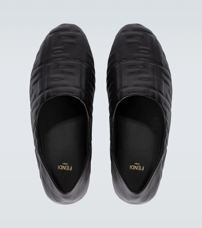 Shop Fendi Ff Embossed Leather Slippers In Black